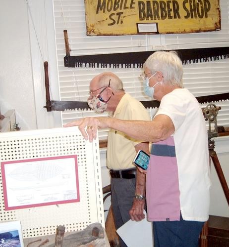Guests browse the timber industry display