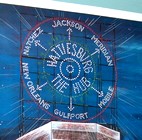 Hub City sign at night