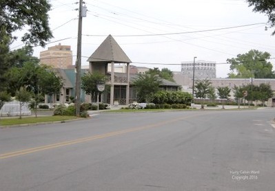 A street with downtown buildings in the distance